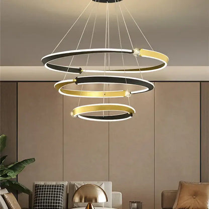 Modern spiral decorbites black gold led chandelier with alternating black and gold rings for dining room or bedroom