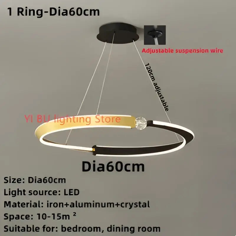 A sleek decorbites black gold led ceiling chandelier with a circular black and gold ring and adjustable suspension wire