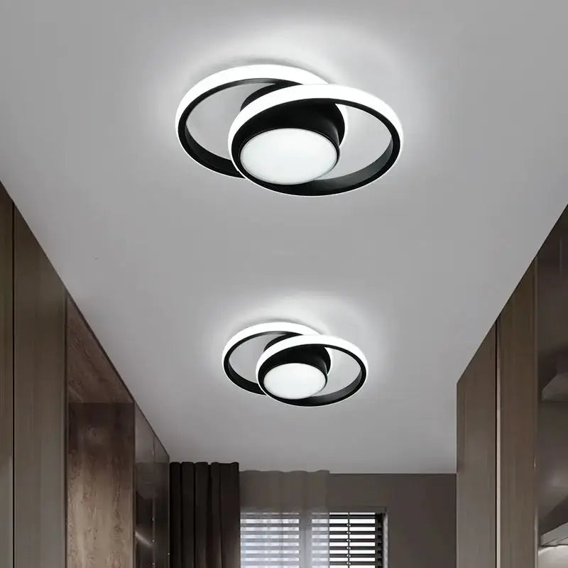Modern black and white circular led ceiling light with sleek minimalist design from decorbites black gold indoor chandelier lighting