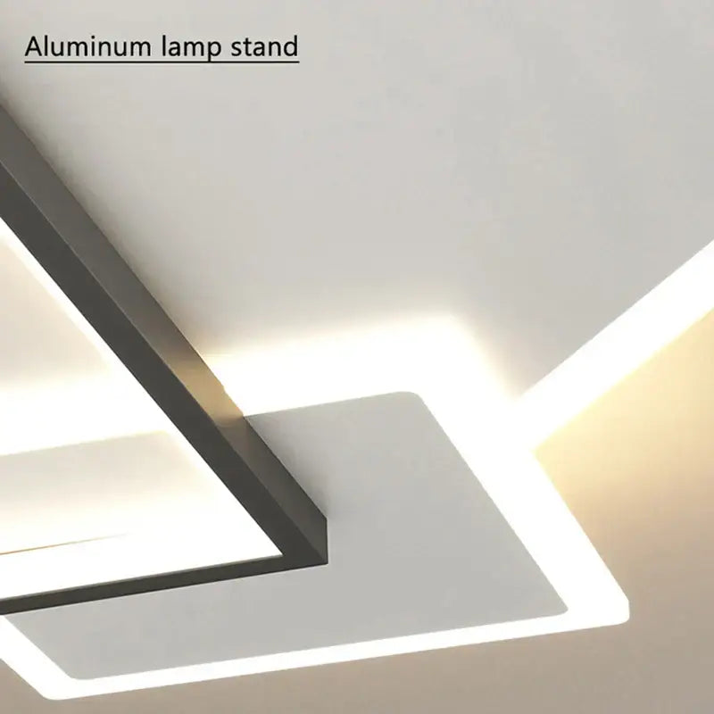 Modern minimalist black gold led chandelier with aluminum frame and integrated led lighting by DecorBites black gold