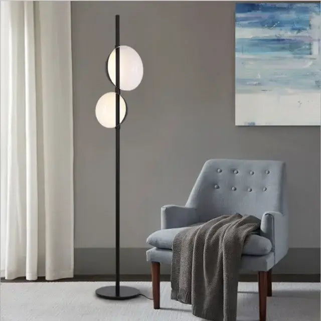 Modern black floor lamp with two spherical white glass shades by decorbites black gold led for elegant lighting