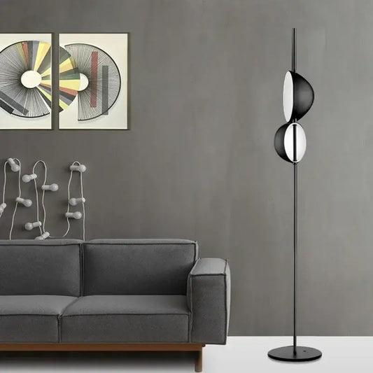 Modern black floor lamp decorbites black gold led with sleek minimalist design featuring two stacked circular shades