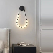 Black gold led DecorBites black gold wall lamp sconce with glowing white bulbs for bedroom and corridor lighting