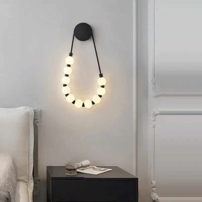 Black gold led DecorBites black gold wall lamp sconce with glowing white bulbs for bedroom and corridor lighting
