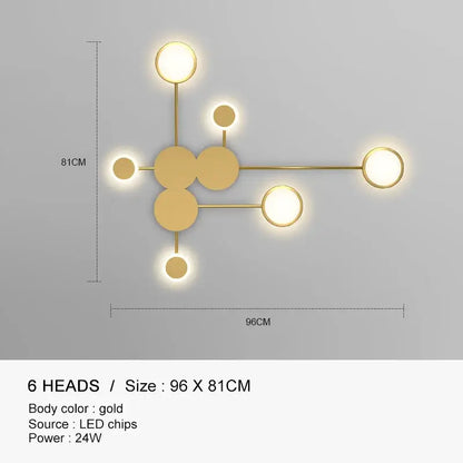 Gold-colored DecorBites black gold LED wall lamp with six illuminated circular heads in molecular design for indoor use
