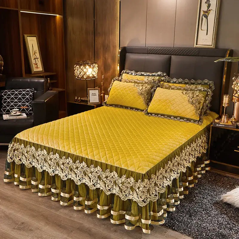 Yellow quilted bed skirt with intricate lace trim and gold accents from decorbites black gold luxury bedding set