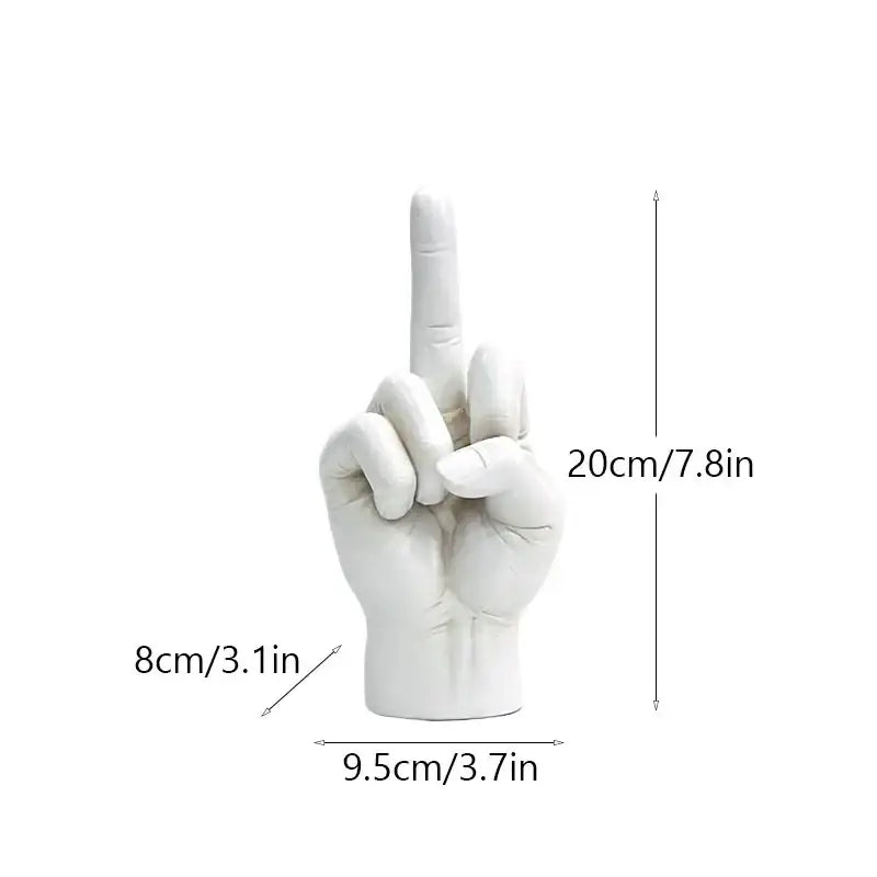 White ceramic hand sculpture with index finger raised as a decorbites black gold modern home decor figurine