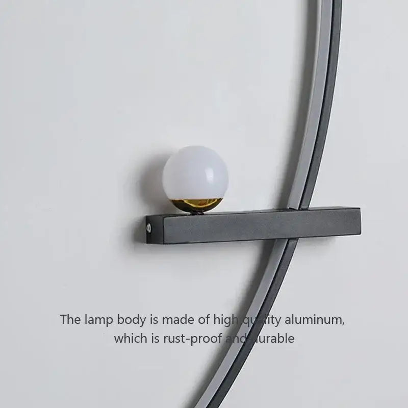 Modern minimalist wall sconce by decorbites black gold with matte black aluminum frame and frosted glass globe bulb for indoor lighting