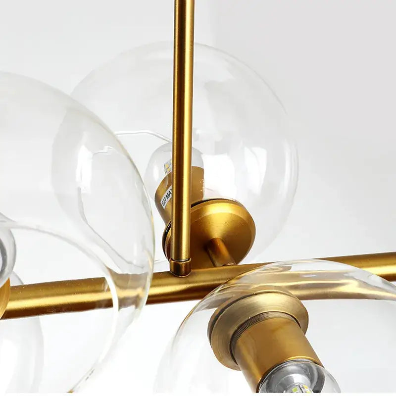 Modern brass and clear glass globe chandelier in black gold finish decorbites black gold molecule design for living room