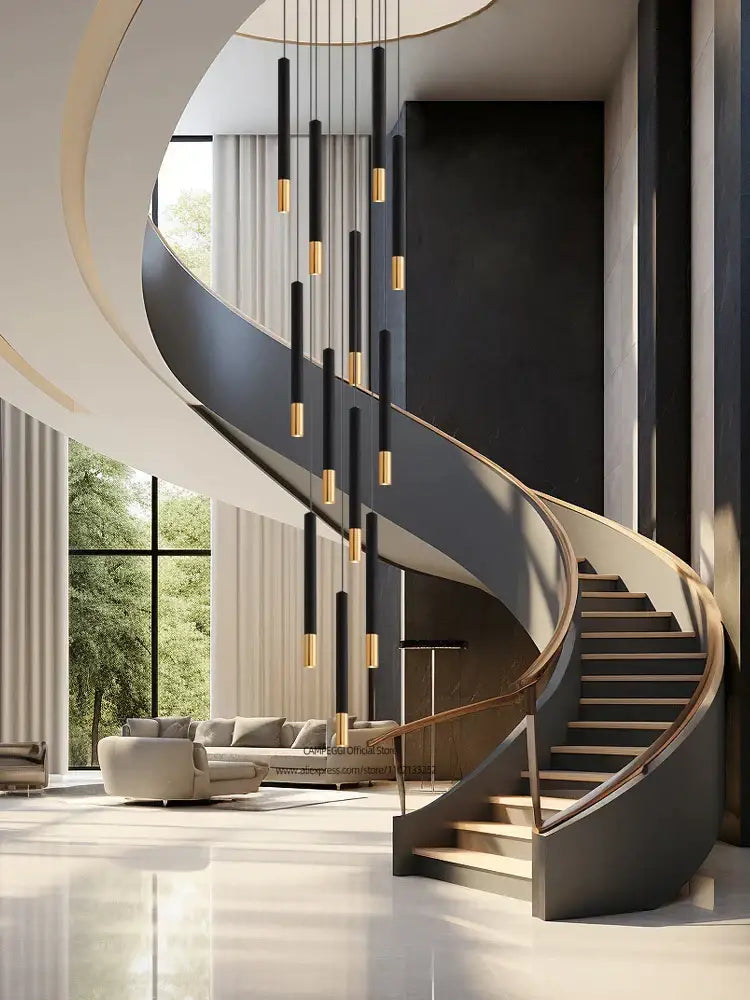 A sleek modern spiral staircase with dark gray steps and a polished wooden handrail complements decorbites black gold pendant lighting