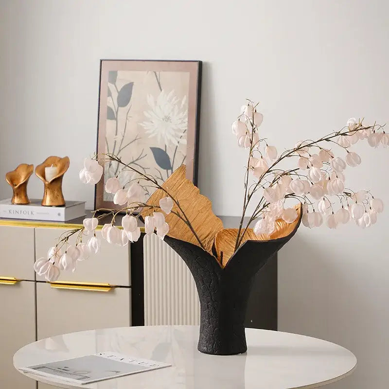 Black ceramic decorbites black gold resin handicrafts vase with gold interior and pink seed pods for home decor