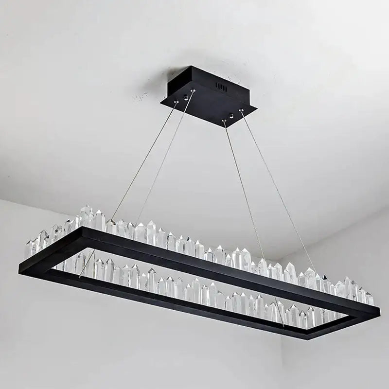 Black gold rings crystal chandelier with black rectangular frame and clear faceted crystals in modern geometric design