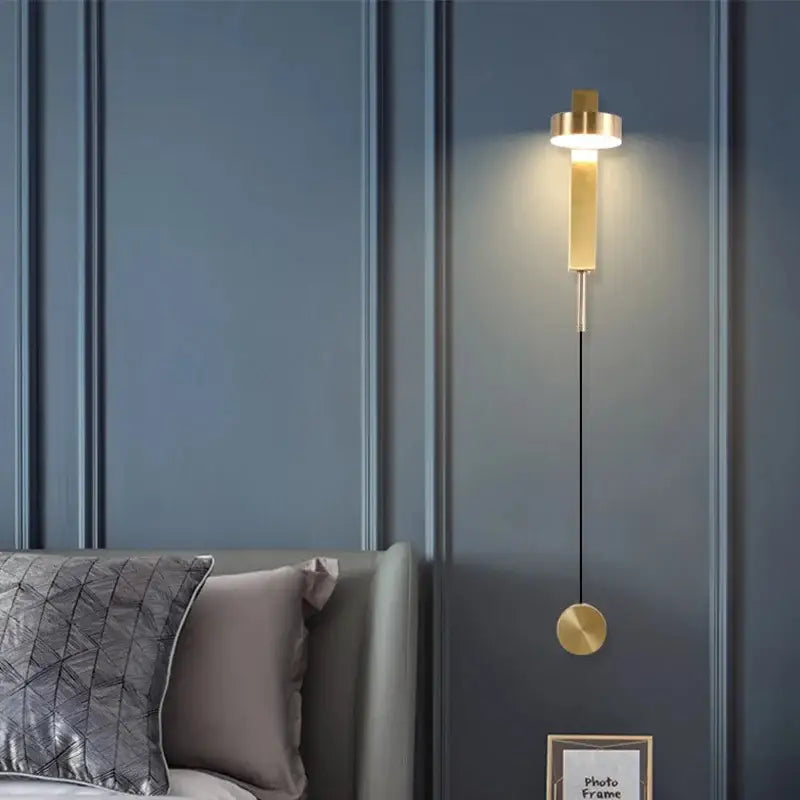 Gold-toned minimalist decorbites black gold rotating wall lamp with vertical bar and round pendant for bedroom and living room