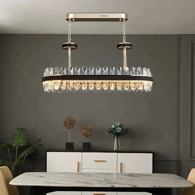 Decorbites black gold round led crystal chandelier with gold-toned oval frame and clear droplets for living room