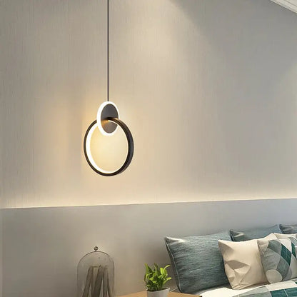 Modern black and white circular pendant light with sleek minimalist design from decorbites black gold round series