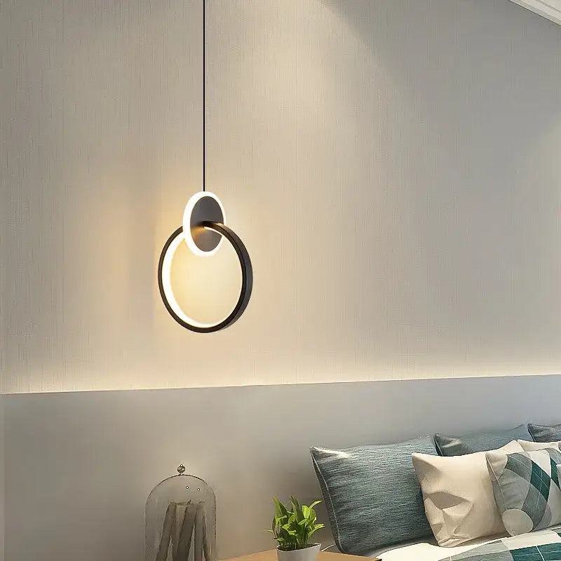 Modern black and white circular pendant light with sleek minimalist design from decorbites black gold round series