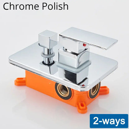 DecorBites™ shower mixing valve with chrome-finished faucet, square plate, two handles, on orange plastic base