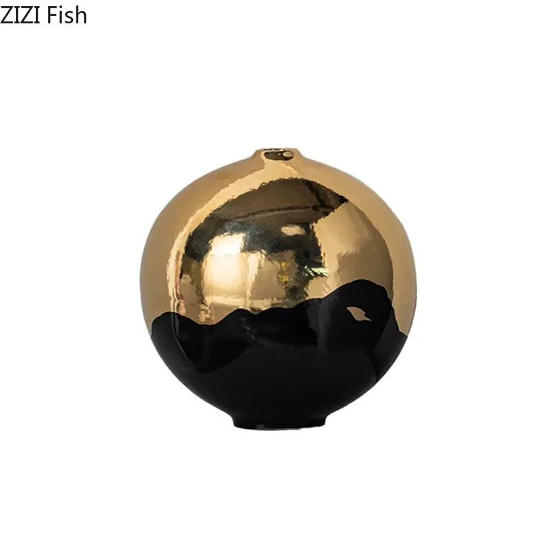 A sleek decorbites black golden ceramic vase with glossy gold upper half and smooth black lower half for room decor