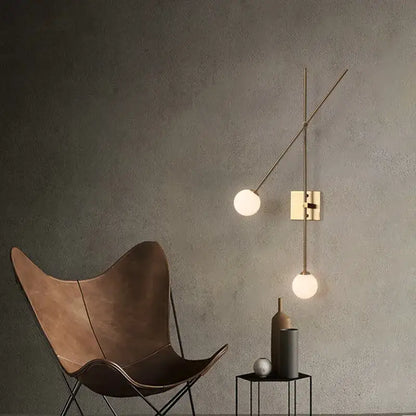 Modern brass wall sconce with two frosted glass globes and minimalist arms decorbites black golden led for foyer bedroom