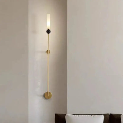 Decorbites™ black green marble wall lamp sconce with gold-toned rod, black accent, and copper acrylic lampshade emitting warm light
