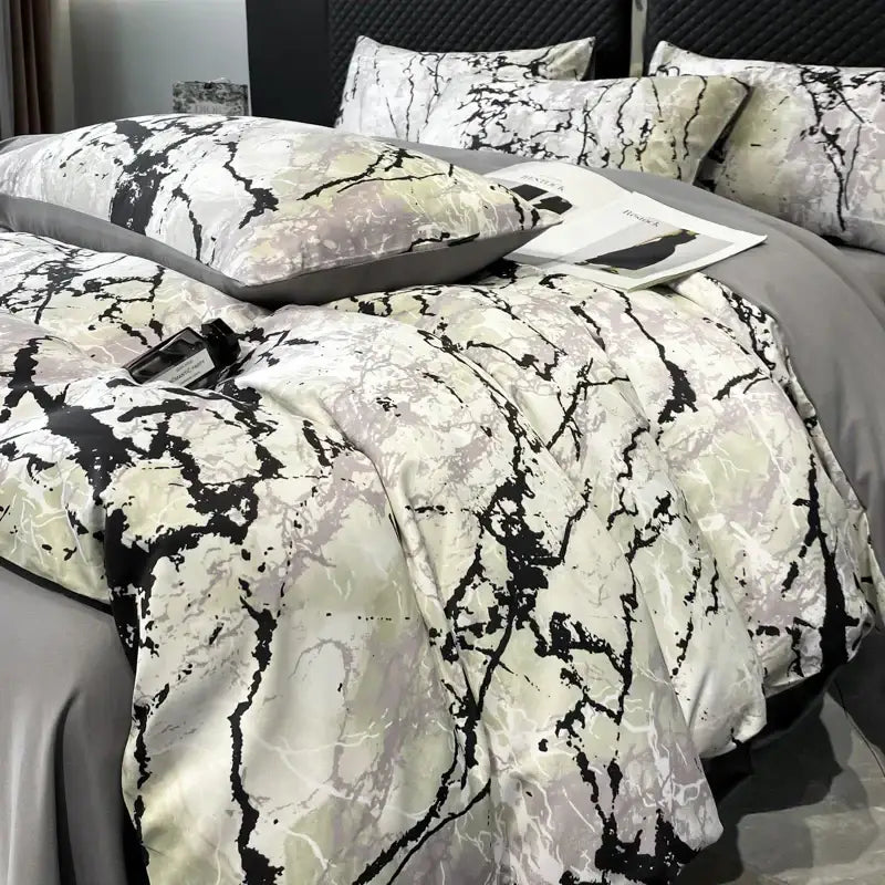 The DecorBites™ black grey marble duvet cover set features a satin-textured ice silk fabric for luxury cooling comfort