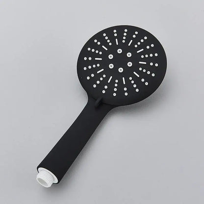 Black matte finish decorbites™ hand-held shower head with circular white nozzles for water saving rainfall use