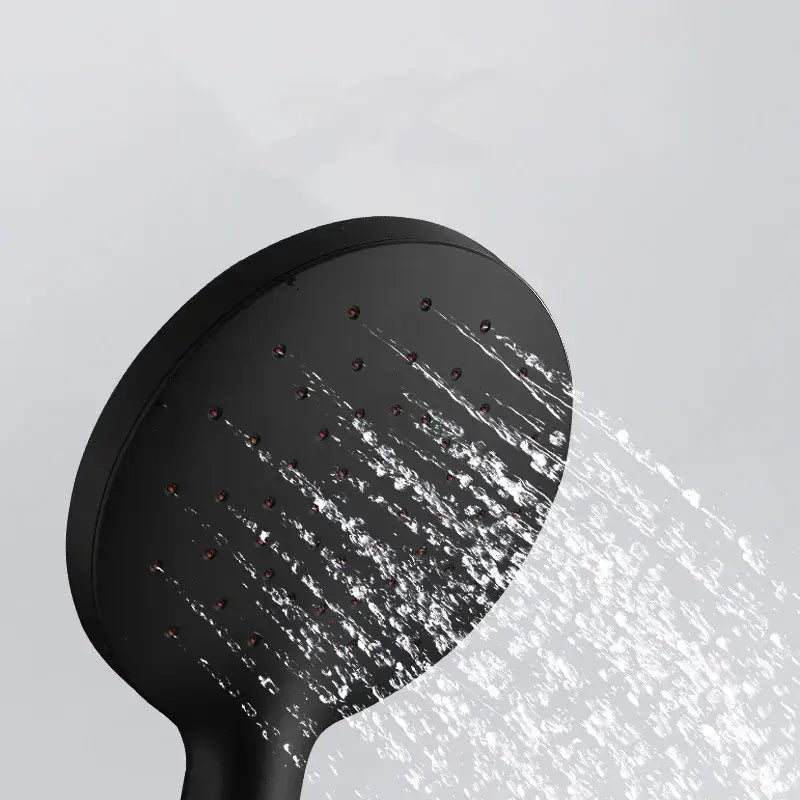 Decorbites black high pressure shower head in matte finish spraying multiple water jets in a fine mist for water saving