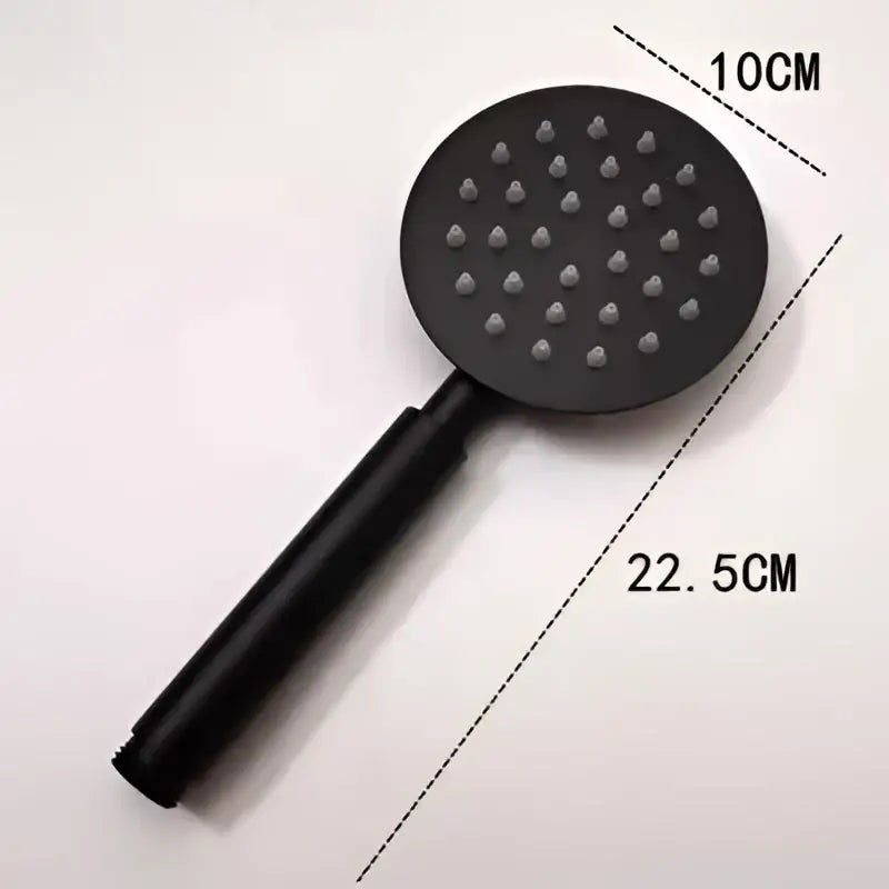 Black high pressure shower head by DecorBites with matt finish circular head featuring 36 nozzles and sleek handle