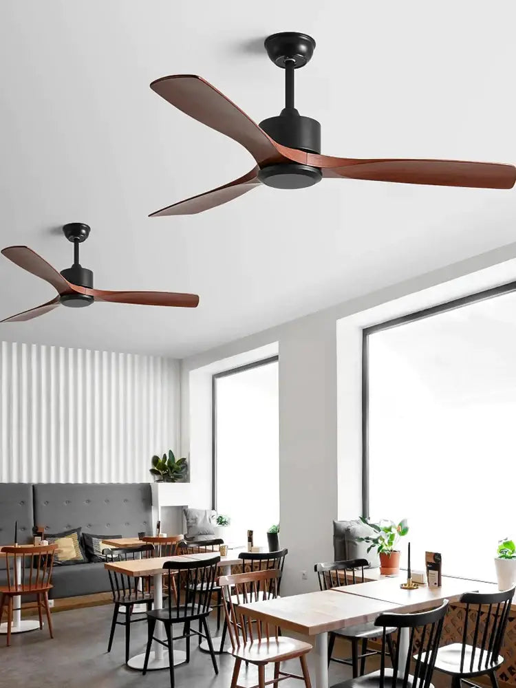 Modern decorbites black industrial ceiling fan with sleek black motor housing and rich brown wooden blades for powerful airflow