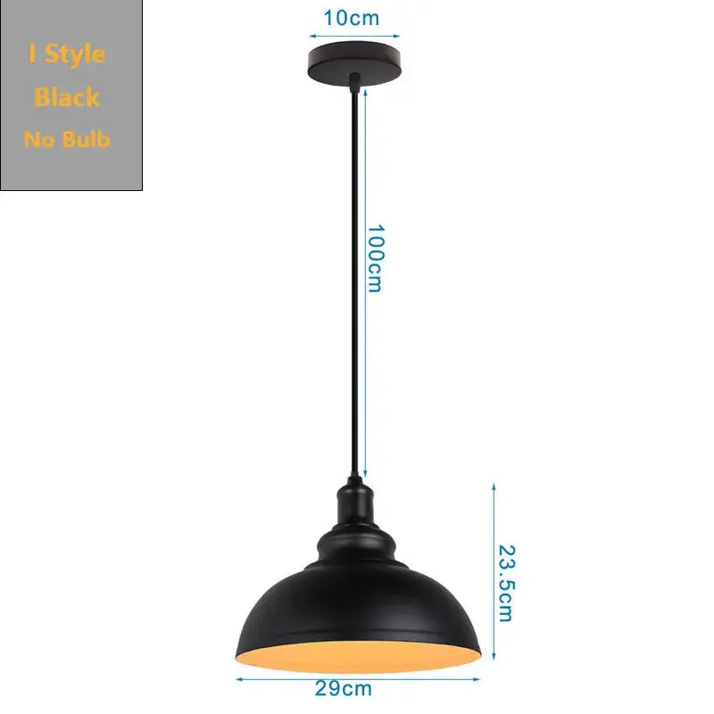 Black industrial pendant light by decorbites with matte finish and orange interior lining for kitchen island bar decor