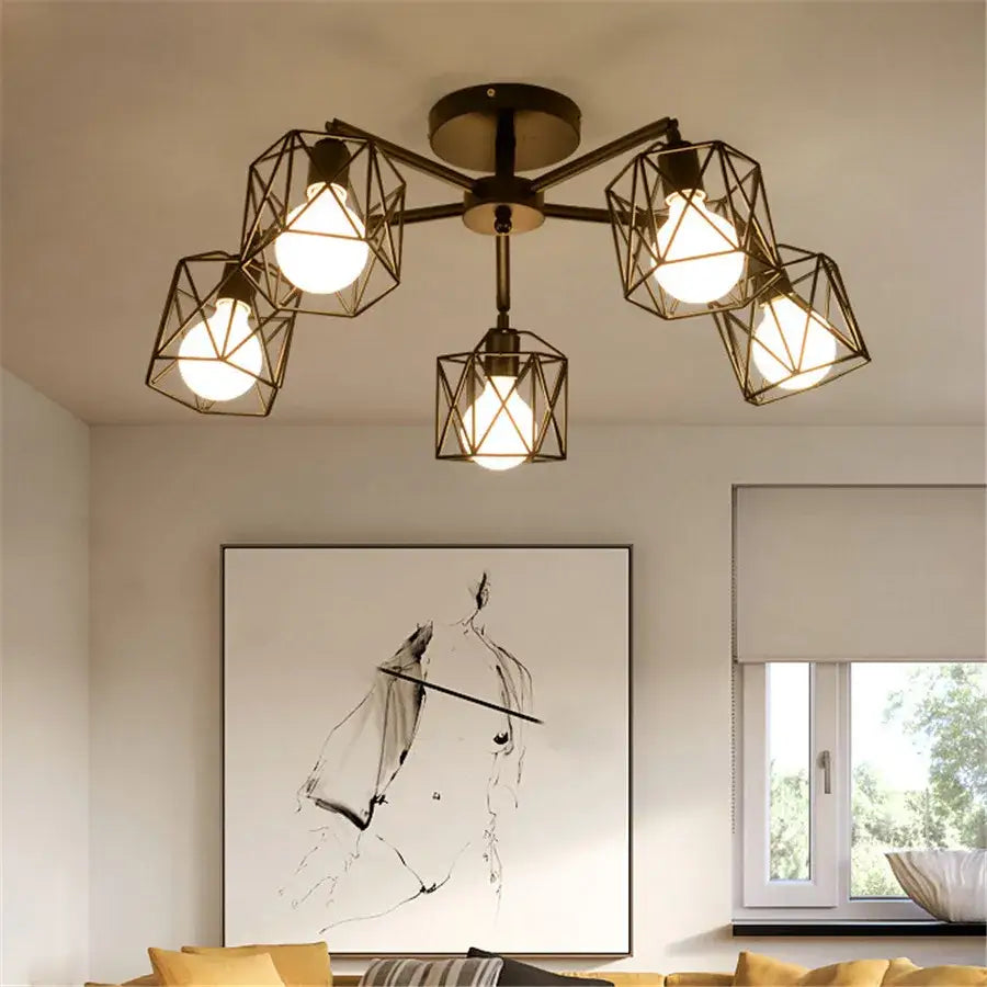 Industrial-style decorbites black iron cage chandelier with five geometric metal cages and exposed bulbs ceiling lamp