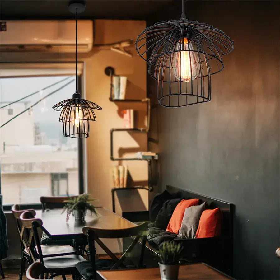 Decorbites black iron pendant light with black iron cage and exposed filament bulbs for kitchen or living room use