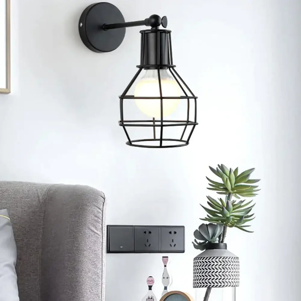 DecorBites black iron wall lamp with iron cage design and exposed bulb for bedroom bar and reading use