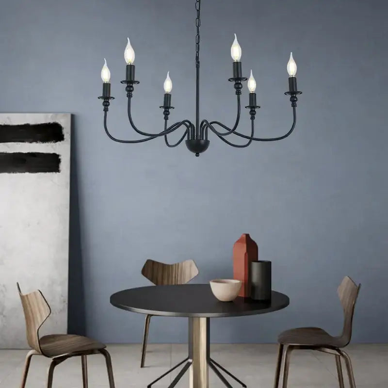 Decorbites black iron chandelier with six candle-style led bulbs in black wrought iron for home and hospitality use