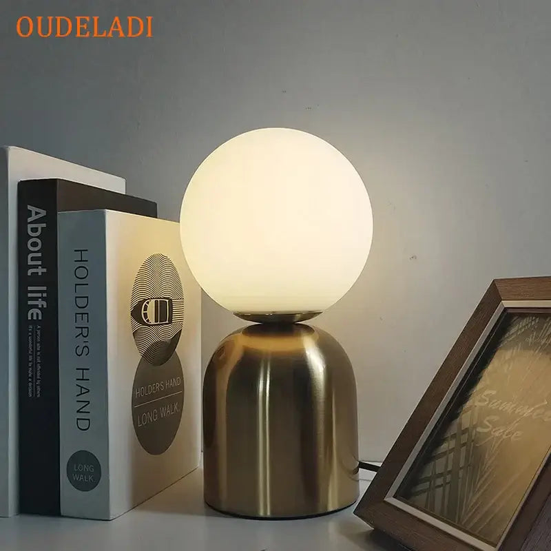 Oudeladi decorbites black iron table lamp with frosted white glass ball shade and brushed gold metallic base for home decor