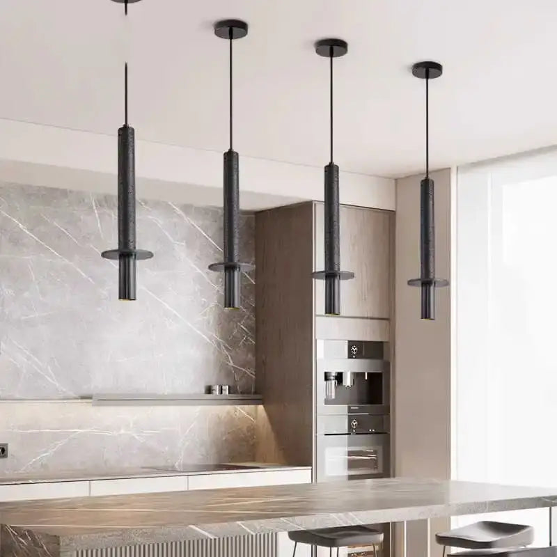 Four sleek decorbites black iron led pendant lights in black iron with matte finish and minimalist design hanging in hallway
