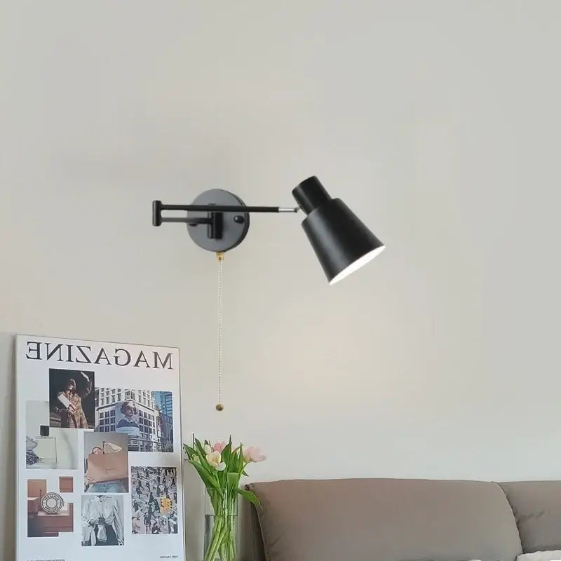 Decorbites black iron wall sconce with black matte finish adjustable arm and pull-chain switch for modern home decor