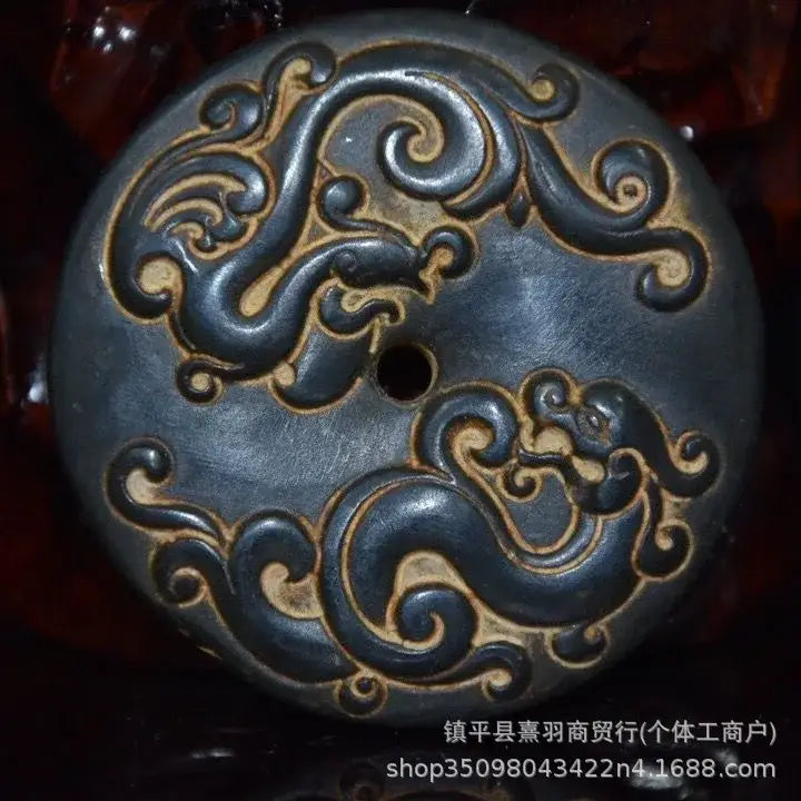Dark blue ceramic button with gold embossed dragon pattern and central hole for decorbites black iron meteorite sun statue