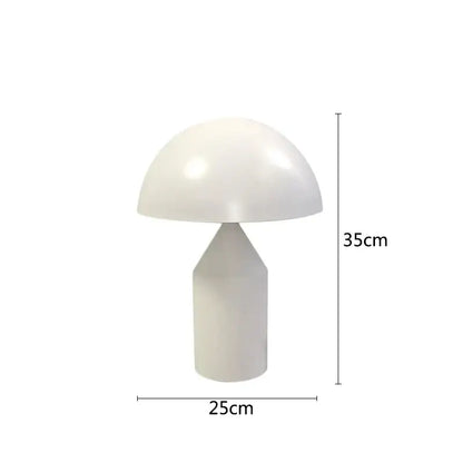 A sleek decorbites black iron mushroom table lamp with a glossy white finish and geometric base for living room use