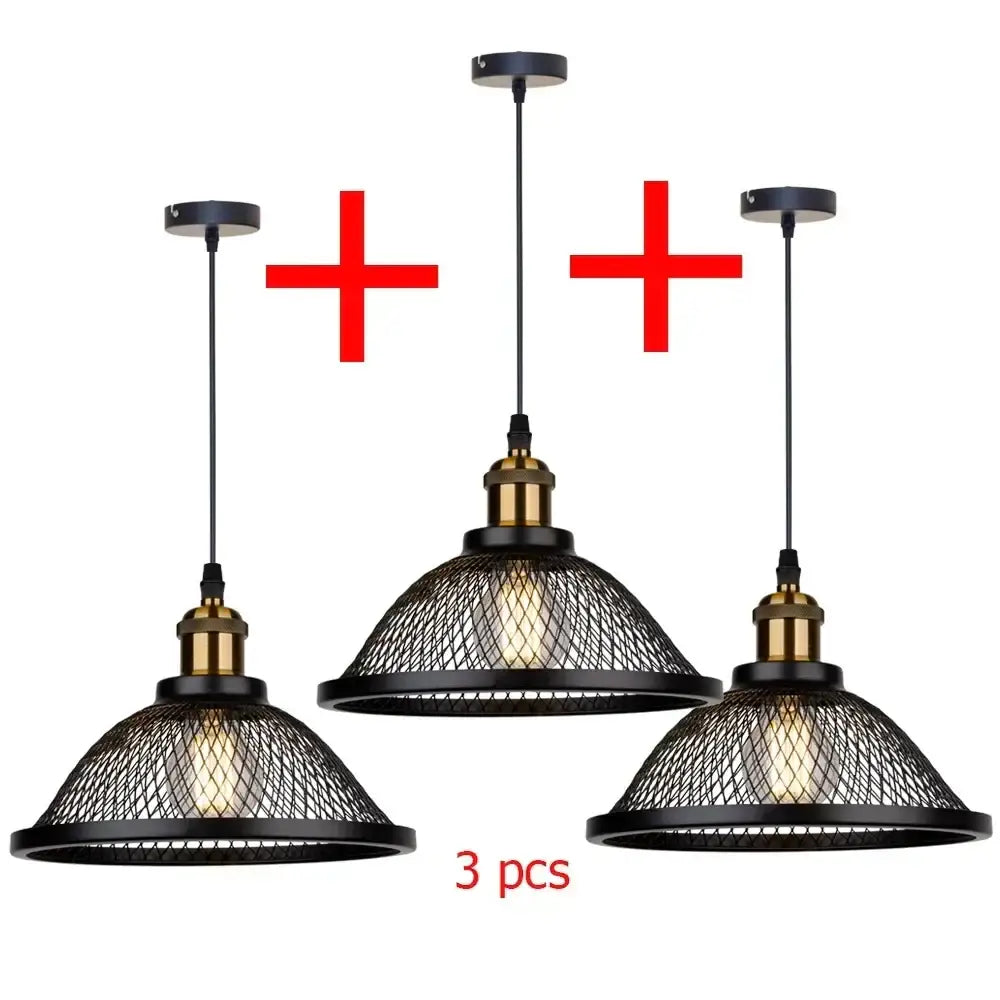 Set of three decorbites black iron pendant lights with brass accents and wire mesh shades for kitchen or living room