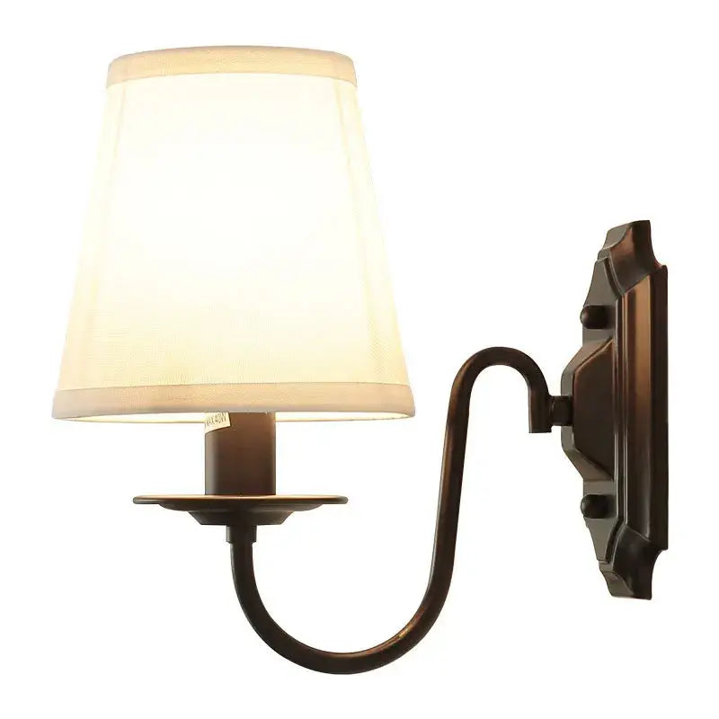 Antique bronze-finished decorbites black iron wall lamp with cream fabric shade for living room and bedroom use