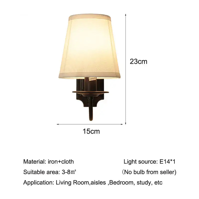 Decorbites black iron wall lamp with beige fabric shade and dark iron base for elegant rural bedroom and living room decor