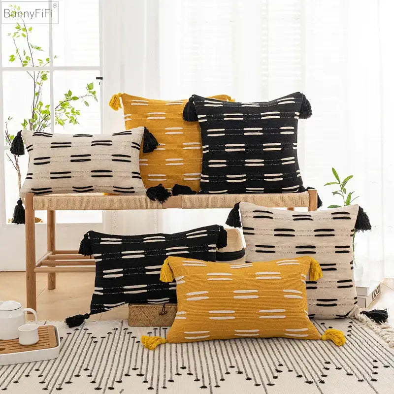 Set of six DecorBites black ivory mustard woven cushion covers with horizontal stripes and tassel trim for living room decor