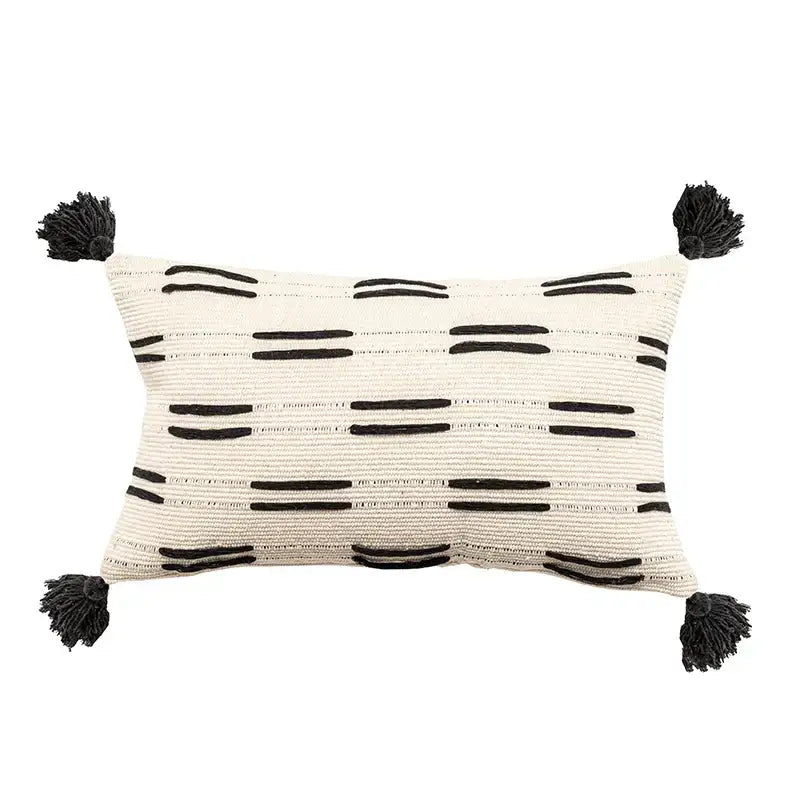 Cream-colored woven cushion cover with black stripes and tassels by decorbites black ivory for living room decor