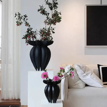 Black ceramic vase with sculpted jellyfish petal ridges and wide flared opening decorbites black jellyfish petal vase