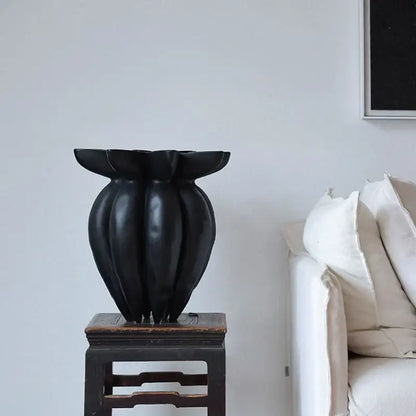 Black jellyfish petal vase by DecorBites features a glossy black ceramic fluted design for artistic home décor