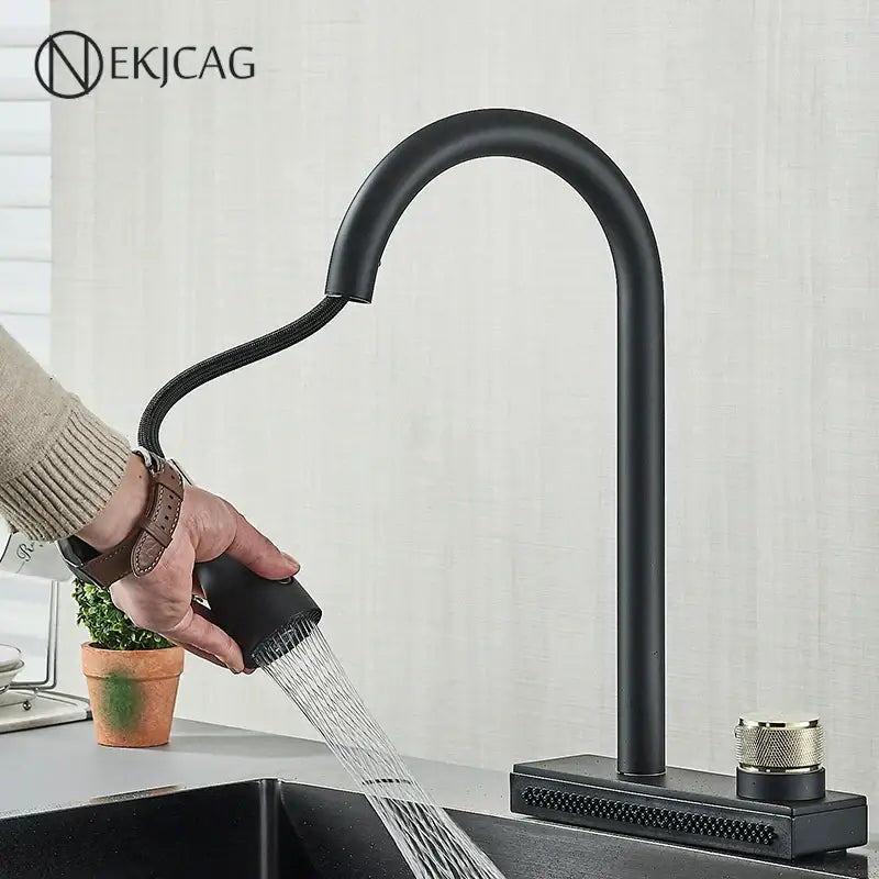 Decorbites black kitchen faucet with matte finish flexible pull out spray and textured gold toned knob base