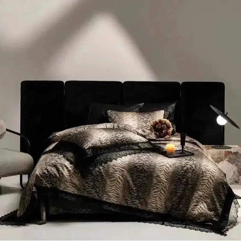 Black velvet headboard with segmented panels complementing DecorBites black lace leopard print bedding set