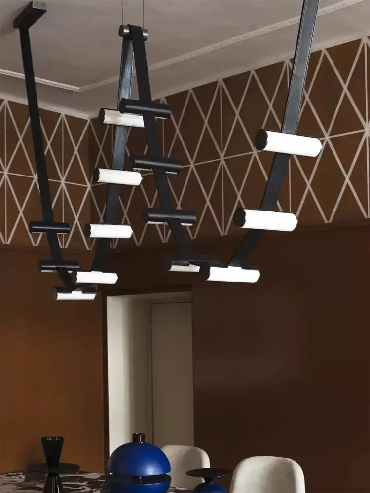 Black and white geometric decorbites black leather pendant light in sleek modern design for dining room decor