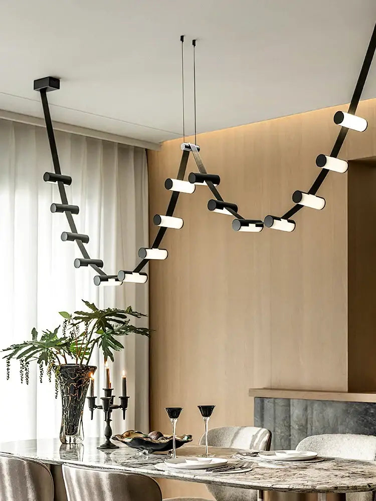 Decorbites black leather pendant light featuring a black and white modular led chandelier with cylindrical lights
